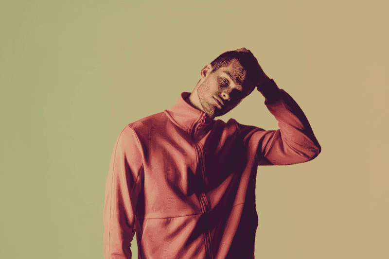 Fashion model in coral sweater